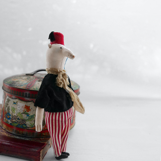 modflowers: winner by a nose - a long nosed bear doll wearing a fez and a monocle