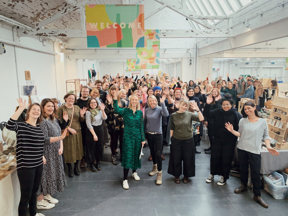 the stallholders of the Paperdolls Market, 2019 with me front right, in black trousers and a dark green top