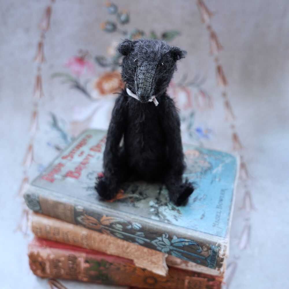 Ossian, a miniature black mohair bear